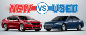 red car and blue car facing each other new vs used.jpg