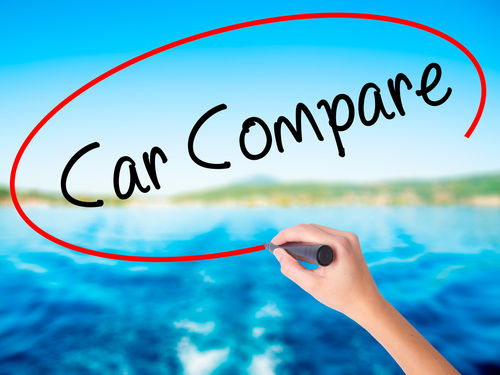 hand writing car compare on window.jpg