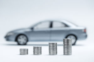 quarters stacking up with car in the background.jpg